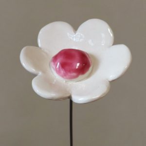 Fleur Blanche cœur Rose